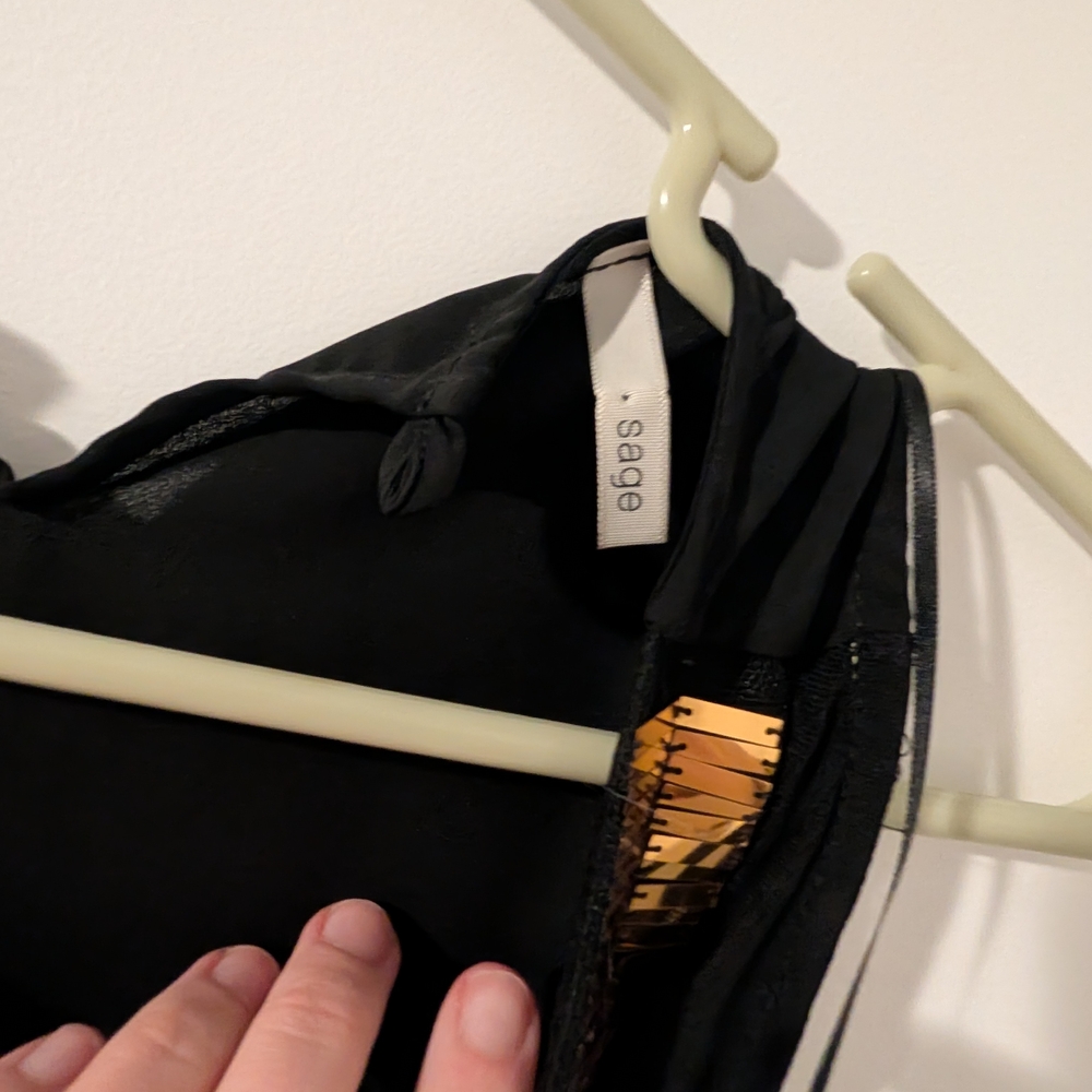 Elegant Sheer Black Sleeveless Top with Gold Accents - Picture 2 of 4